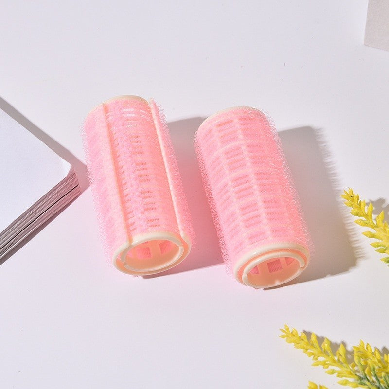 Rolos de cabelo rosa sem calor